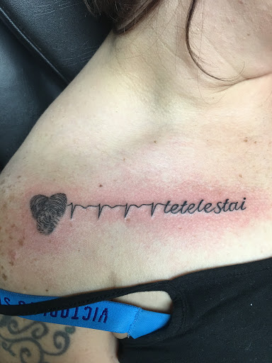 Explore cute dinosaur tattoo ideas, creative tattoo ideas in Warner Robins, available at Untold Pain Tattoo Studio