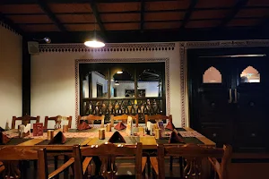Malika Family Dining and Bar image