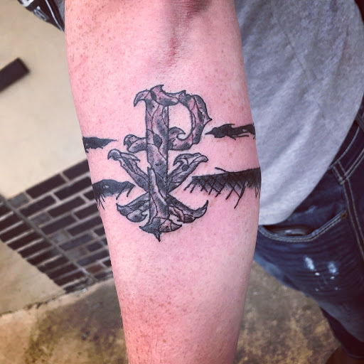 Explore mechanic sleeve tattoo ideas, creative tattoo ideas in Jonesboro, available at Gallery Of Ink Tattoo Shop