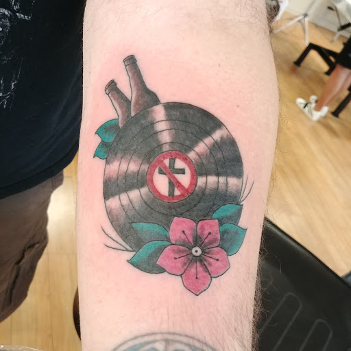 Explore 3 percent tattoo ideas, creative tattoo ideas in Liberty, available at Dark Lotus Tattoo & Salon