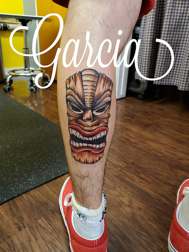 Explore childhood trauma tattoo ideas, creative tattoo ideas in Kearney, available at Ink Shop Tattoos & Piercings