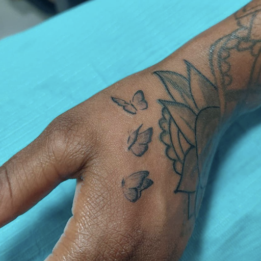 Explore dog outline tattoo ideas, creative tattoo ideas in Miami, available at Tattoos by Lou Miami - North Miami