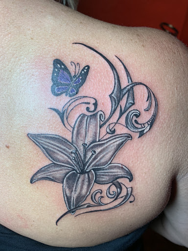 Explore navel tattoo ideas, creative tattoo ideas in Odessa, available at Evil Ink Tattoo