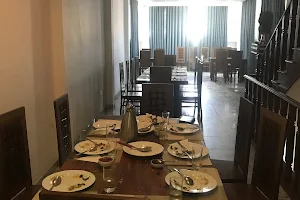 Friendship Family Restaurant and Hotel image