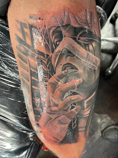 Explore spine tattoo cover up ideas, creative tattoo ideas in Mesa, available at Smiley Ink Tattoos