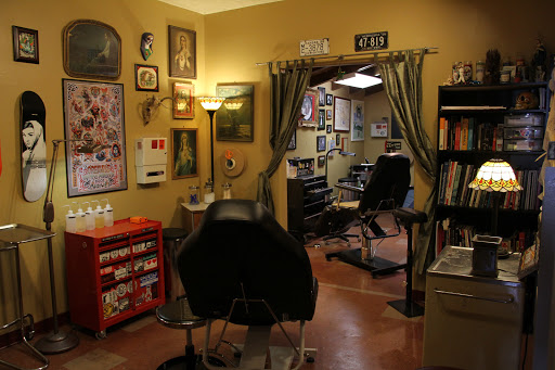 Explore tribal band tattoo ideas, creative tattoo ideas in Omaha, available at Liquid Courage Tattoos