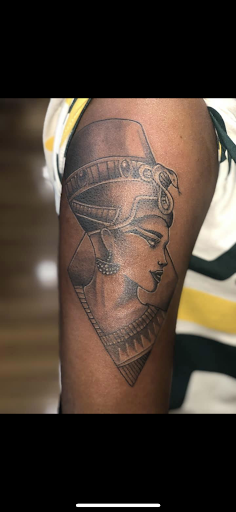 Explore tattoos on hand ideas, creative tattoo ideas in Jamaica, available at Rising Phoenix Ink