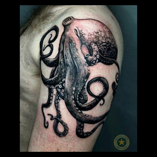 Explore lion cub tattoo ideas, creative tattoo ideas in Miami, available at Miami Tattoo & Co Midtown