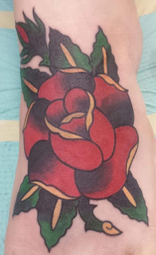 Tattoo Shop «Grapes Designs», reviews and photos, 103 S 3rd St, Scottsville, KY 42164, USA