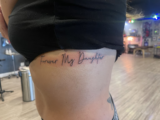 Find ouija board tattoo ideas for your next unique tattoo in North Salt Lake at Saber House Tattoo