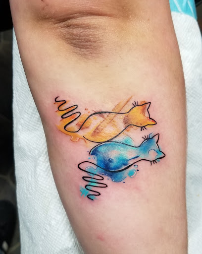Find in between boob tattoo ideas for your next unique tattoo in Stetsonville at Solace Ink Company LLC