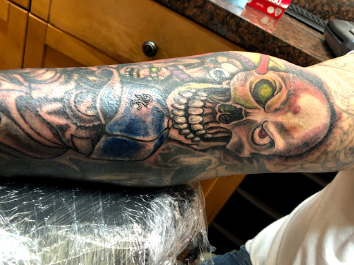 Explore fighter tattoo ideas, creative tattoo ideas in Okeechobee, available at Muck City Tattoos & Piercings
