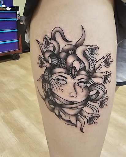 Explore wrist tattoo ideas men, creative tattoo ideas in New Hampton, available at Crescent Moon Tattoo