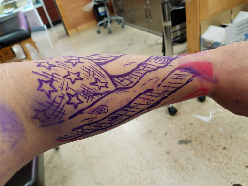 Find small cat tattoo ideas for your next unique tattoo in Austin at Atomic Tattoo & Body Piercing