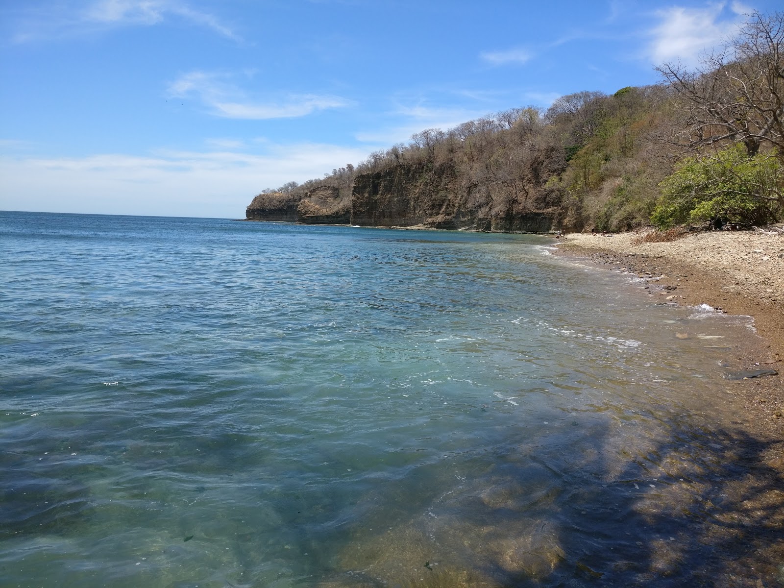 Fotografija Tibia beach z turkizna voda površino