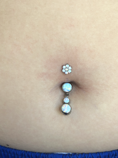 Explore buddhist tattoo ideas, creative tattoo ideas in Bloomington, available at Evil by the Needle Custom Tattoo and Piercing Studio