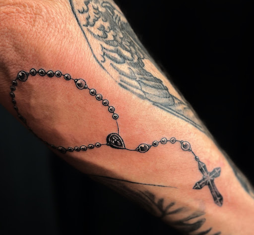 Explore rose tattoo ideas for, creative tattoo ideas in Houston, available at The Dark Anchor