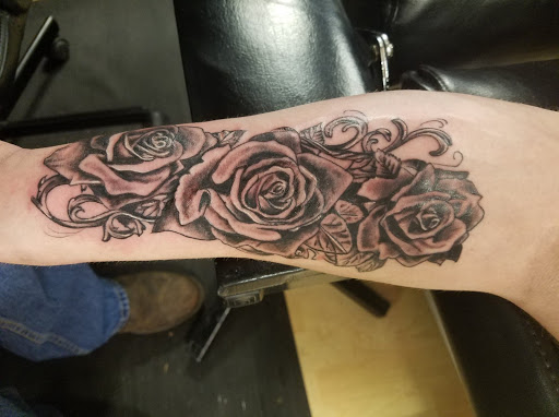 Explore thigh flower tattoo ideas, creative tattoo ideas in Sedalia, available at Skin Thieves Tattoo Studio