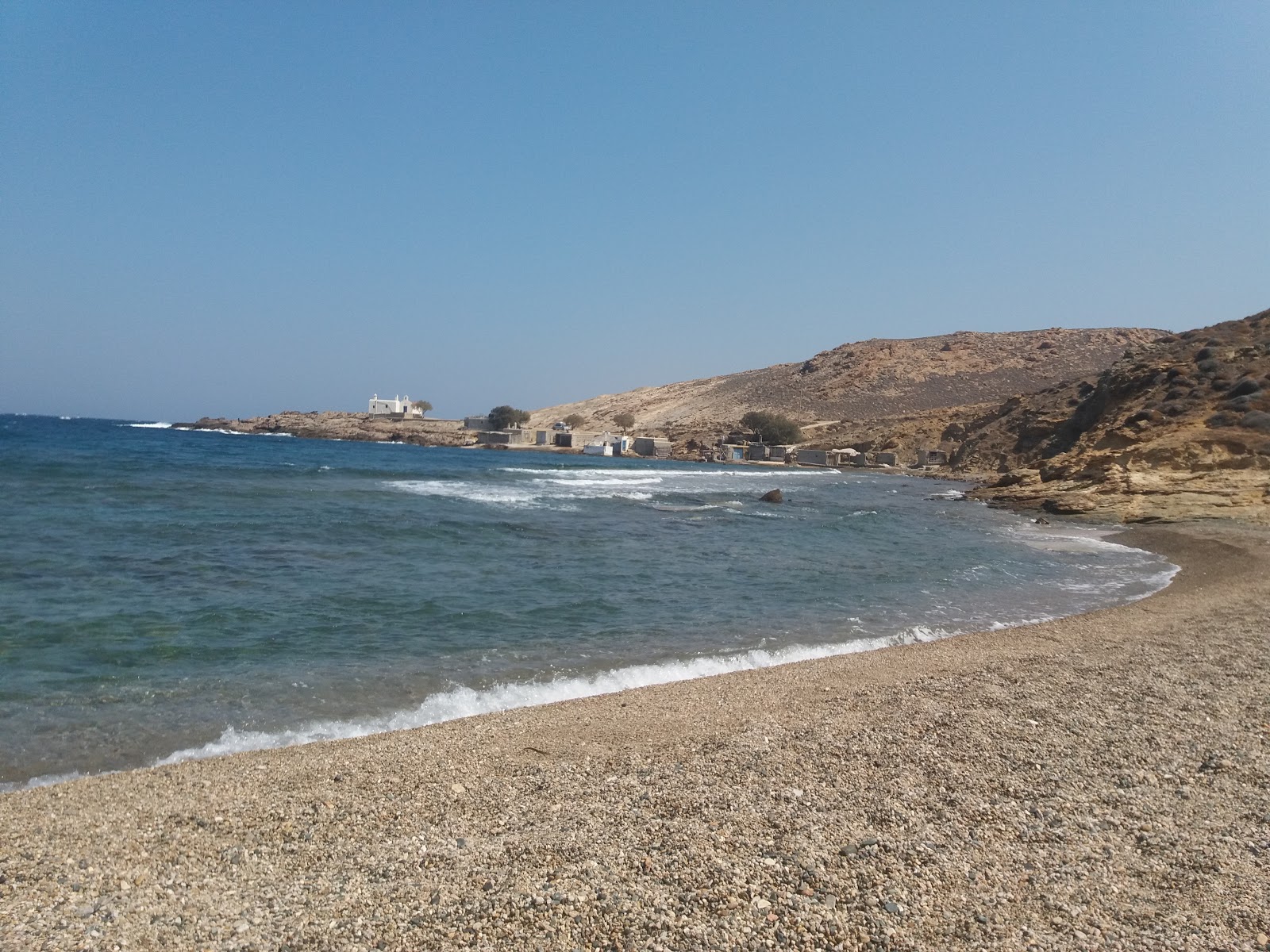 Photo of Paralia Merchias with blue pure water surface