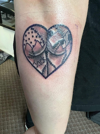 Explore infinity name tattoo ideas, creative tattoo ideas in Angola, available at Hoodlum Ink