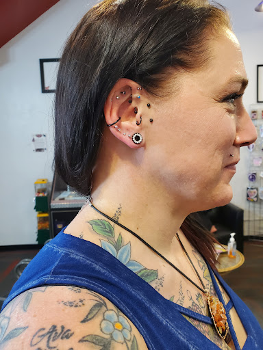 Explore black bird tattoo ideas, creative tattoo ideas in Green Bay, available at Colourbox Body Piercing Llc