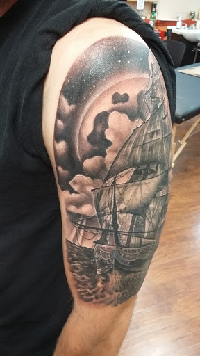 Explore mens hand tattoo ideas, creative tattoo ideas in Pikeville, available at Small Town Tattoo