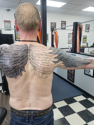 Explore fishing pole tattoo ideas, creative tattoo ideas in Green Bay, available at Sonic Tattoos