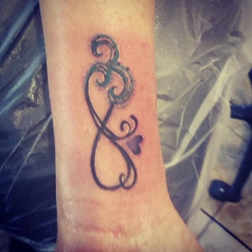 Explore good wrist tattoo ideas, creative tattoo ideas in Amarillo, available at Music Box Body Art Studio