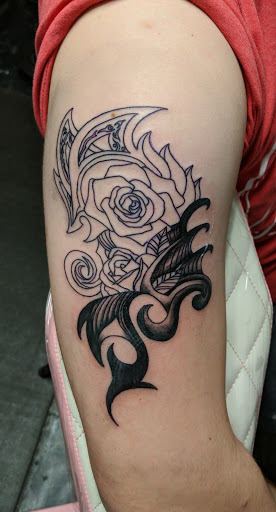 Explore yoga tattoo ideas, creative tattoo ideas in Summerville, available at Mystic Tiki Tattoo Studio & Gallery