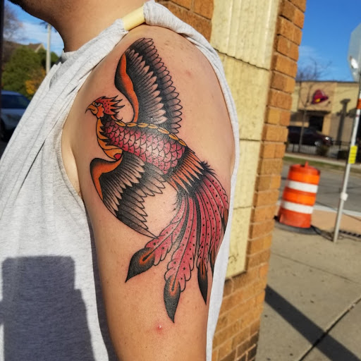 Explore machine tattoo ideas, creative tattoo ideas in Milwaukee, available at Atomic Tattoos