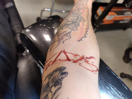 Explore inner bicep tattoo ideas for guys, creative tattoo ideas in Albuquerque, available at Factory Edge Tattoo and Piercing Coronado