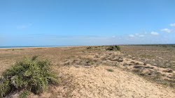 Foto von Regencia Strand mit lange, gerade küste