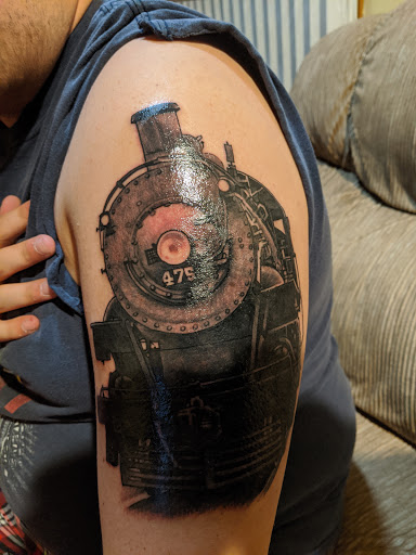 Explore elephant tattoo ideas for guys, creative tattoo ideas in Scranton, available at Marcs Tattooing