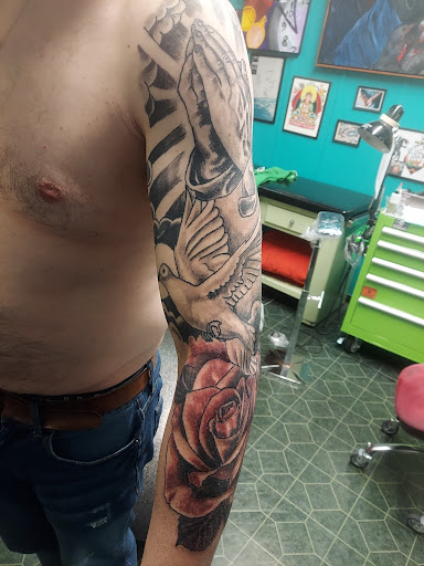 Explore smile tattoo ideas, creative tattoo ideas in Saginaw, available at Adorned With Envy