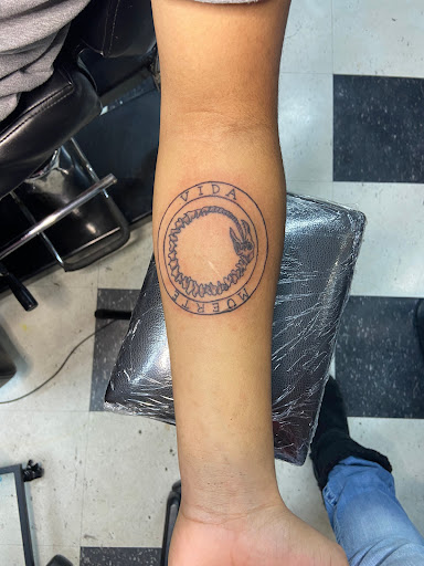 Explore carnation tattoo ideas, creative tattoo ideas in Waynesboro, available at Extreme Expressions