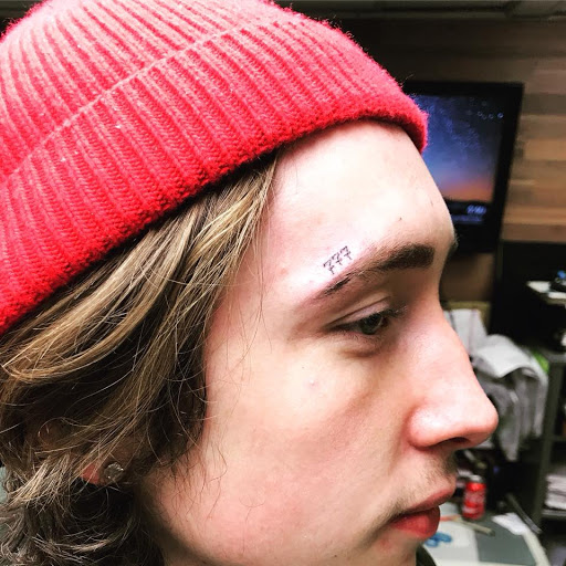 Explore malcolm x tattoo ideas, creative tattoo ideas in Milwaukee, available at Bay Street Tattoo Co.