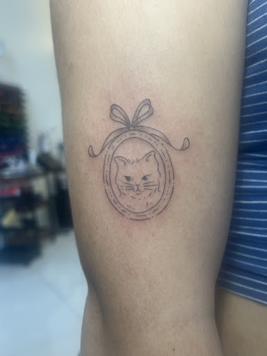 Explore june birth flower tattoo ideas, creative tattoo ideas in Orange, available at Baron Art Tattoo