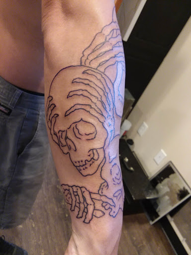 Explore tattoo ideas for inner forearm, creative tattoo ideas in Des Moines, available at Hooligan Tattoo