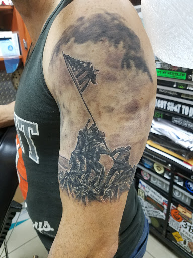 Explore cover up tattoo ideas lower back, creative tattoo ideas in Taylor, available at Eternal Tattoos Inc