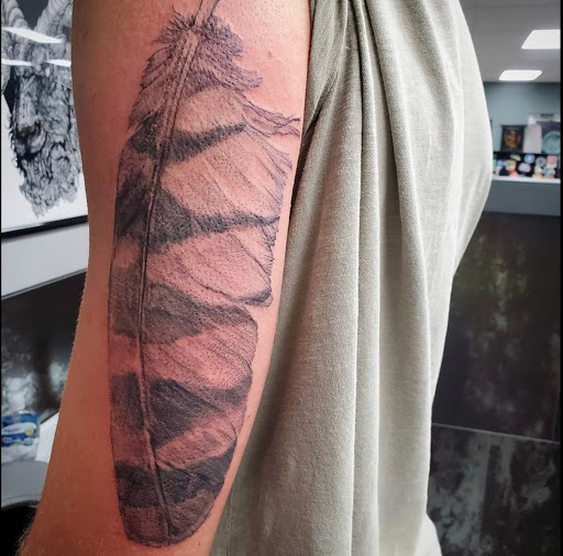 Explore tattoo ideas for triceps, creative tattoo ideas in Nashville, available at Titan Tattoo