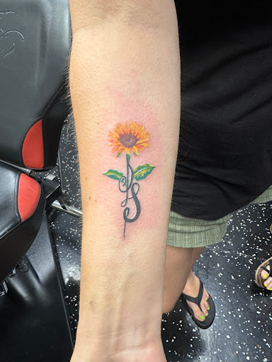 Explore breast cancer tattoo ideas, creative tattoo ideas in Fort Myers, available at Loyal 2 The Coil Tattoos & Piercings (Edison Mall Location Entrance F)