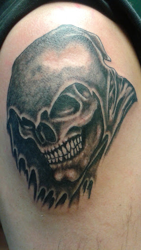 Explore mens tattoo ideas chest, creative tattoo ideas in Valley Park, available at Full Spectrum Tattoo