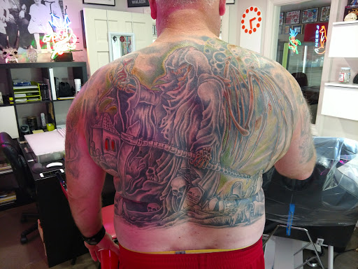 Explore brass knuckle tattoo ideas, creative tattoo ideas in Duncansville, available at Paragon Tattoo