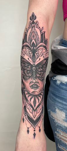 Find cute tattoo ideas for black females for your next unique tattoo in Amsterdam at Spoken Hand Tattoo