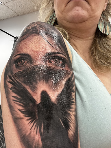 Explore women's tattoo sleeve ideas, creative tattoo ideas in Billings, available at Inkredible Art Productions