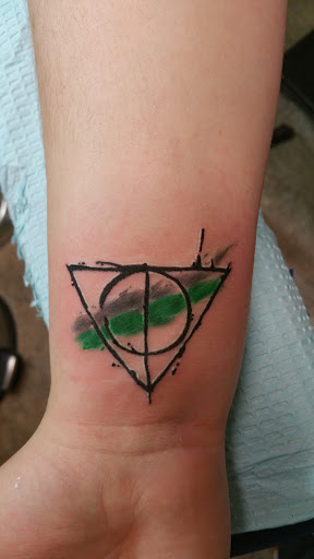 Explore iowa hawkeye tattoo ideas, creative tattoo ideas in Storm Lake, available at Alley Cat Tattoo