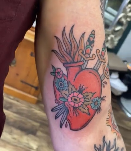 Explore 2 cat tattoo ideas, creative tattoo ideas in Baltimore, available at Rippd Canvas Tattoo Shop Artists Social Club