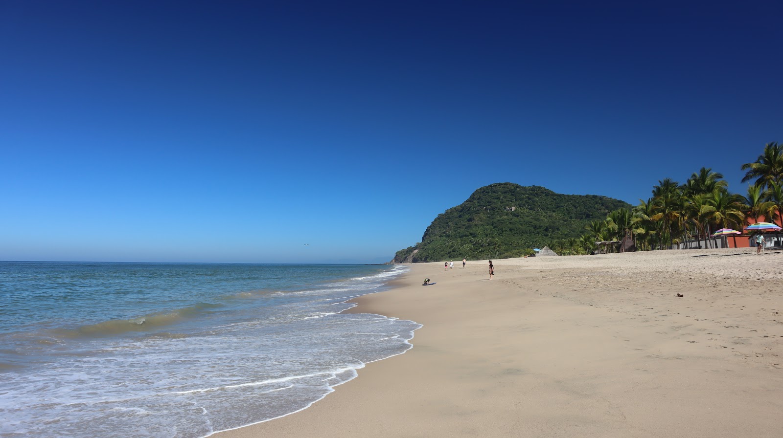 Foto di Lo de Marcos beach con una superficie del sabbia beige