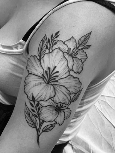 Explore tattoo ideas for top of leg, creative tattoo ideas in Harrisburg, available at Capital Tattoo Company