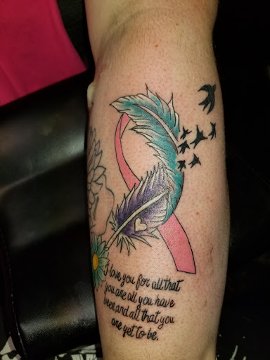 Explore signature tattoo ideas, creative tattoo ideas in Onalaska, available at Divine Designs tattoo studio